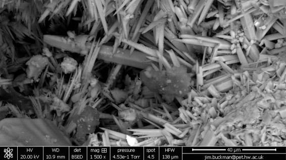 Aragonite crystals infilling pore space within sandstone Aragonite crystals infilling pore space within sandstone
