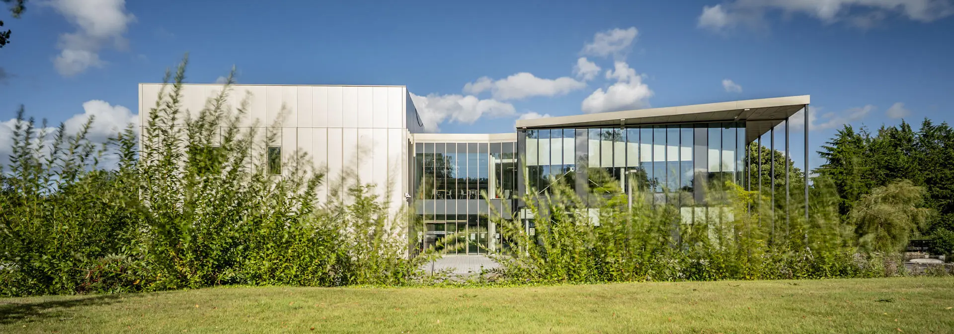 The GRID building with blue sky behind.