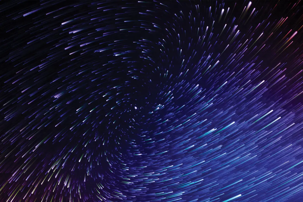 swirling points of light in space
