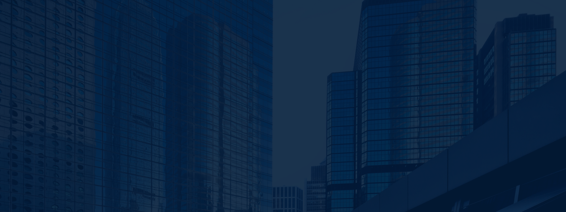 City skyline made up of blue skyscraper buildings.