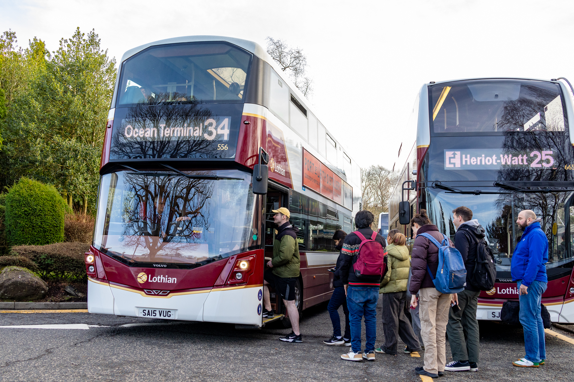 Students getting on the buses at the Edinburgh campus