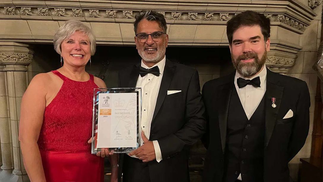 Heriot-Watt staff with the Gold Award (L to R) Helen Hymers, Head of Employee Relations and Policy; Dr Amos Haniff, Pan-Dean and Armed Forces Engagement lead; Mark Hamid, Senior Governance Officer and Senate Clerk, who is a Royal Navy reservist Heriot-Watt staff with gold award certificate