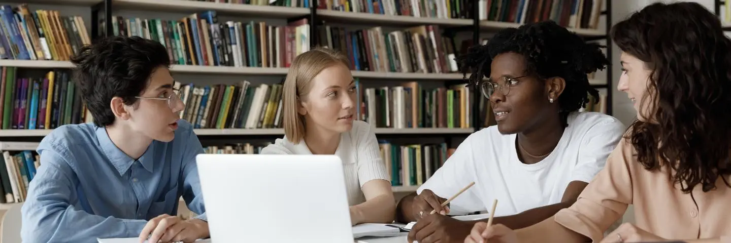 Group of students studying at table