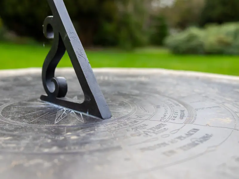 Close up picture of a sun dial on the Edinburgh Heriot-Watt campus.