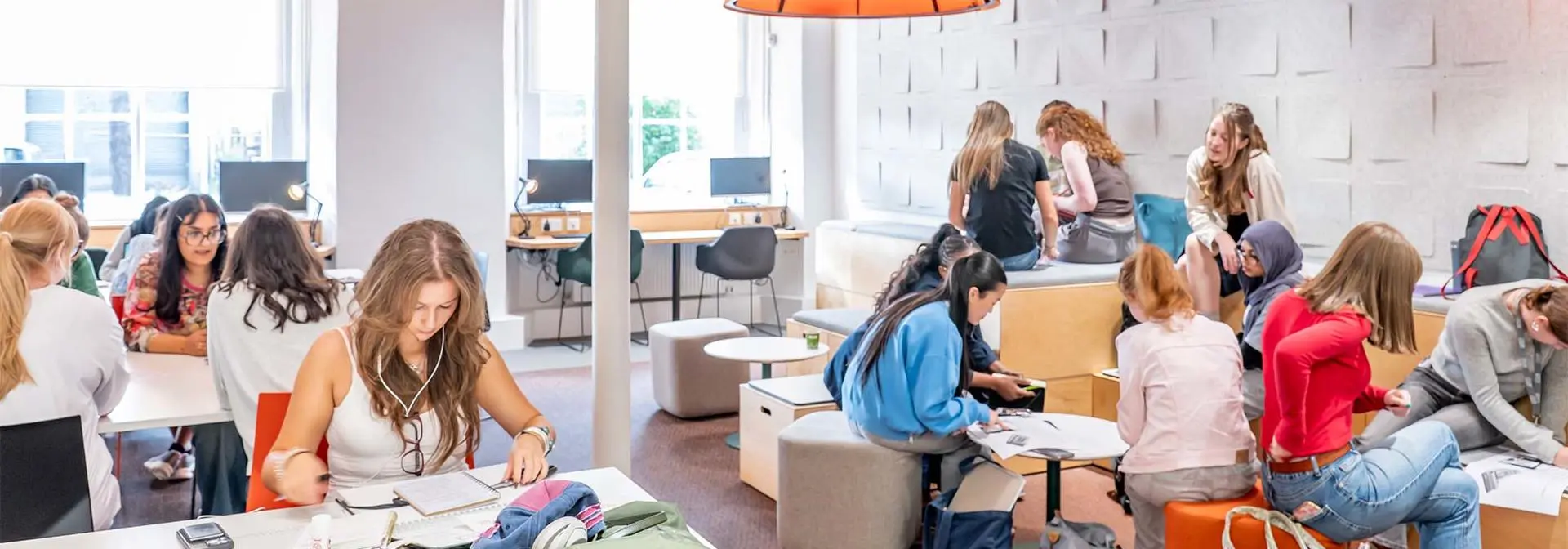 Students working in the Student Commons at the Borders Campus