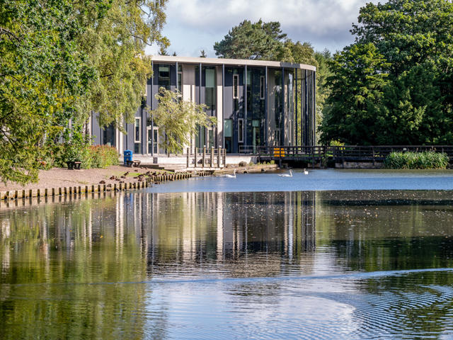 A loch beside a building.
