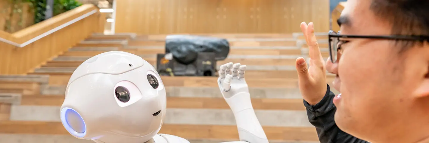 robot giving a human a high-five