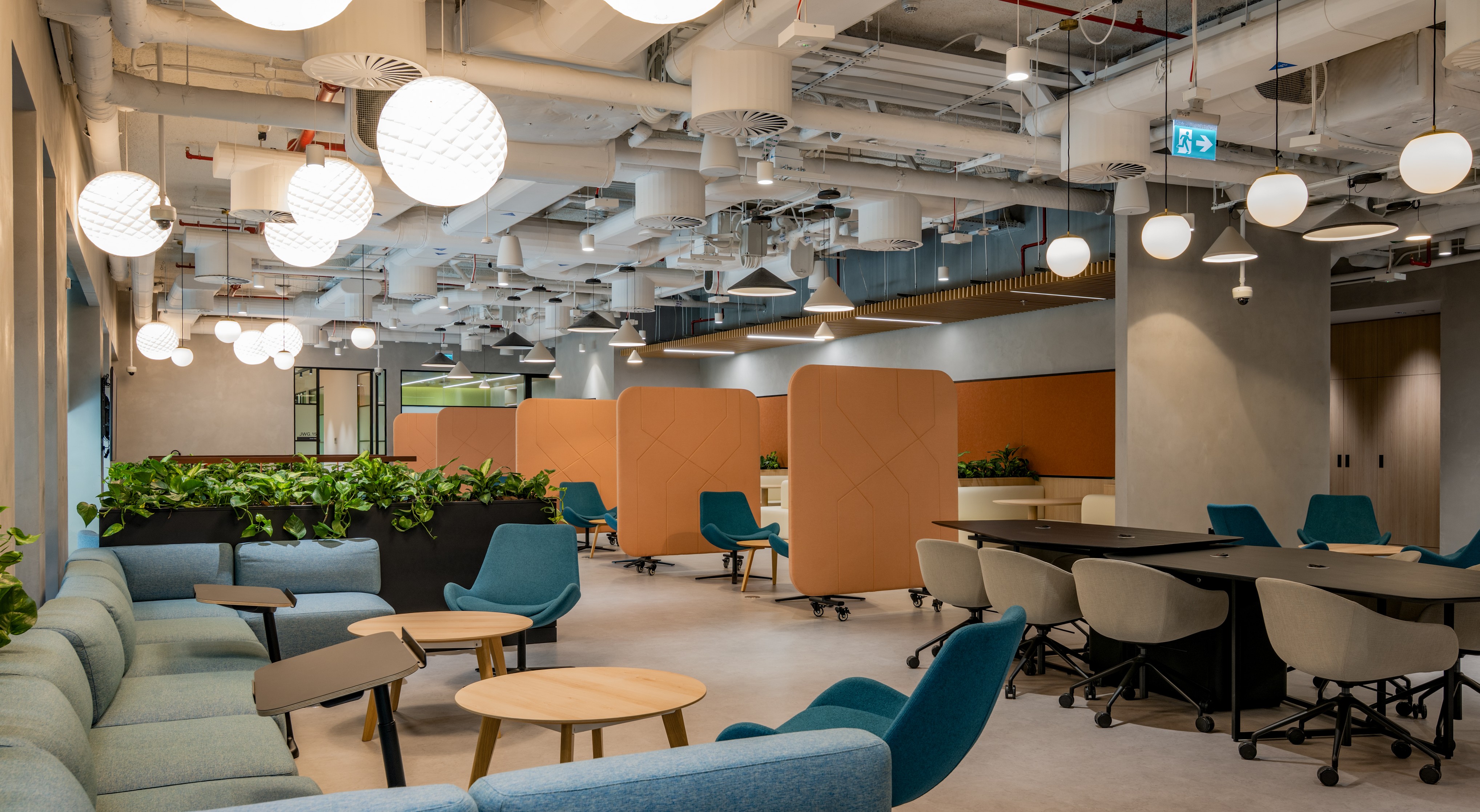 lounge style sofas and seats with low tables and dividers