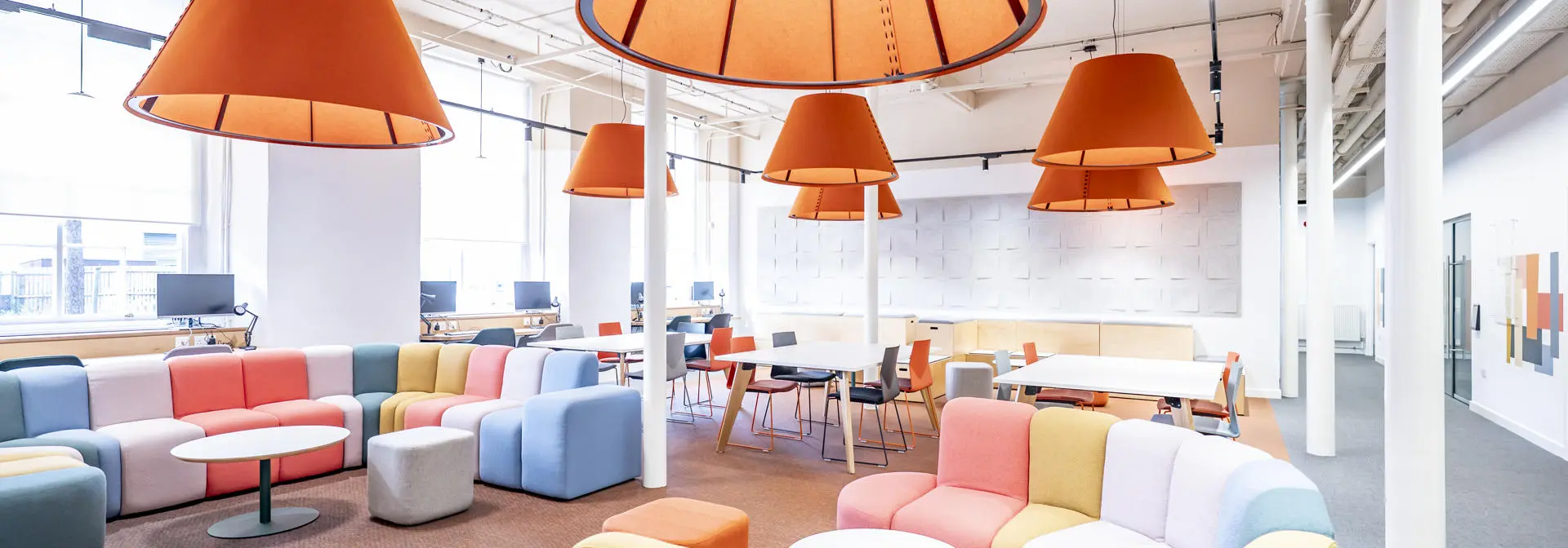 A bright, modern study space with colourful seating at the Scottish Borders campus.