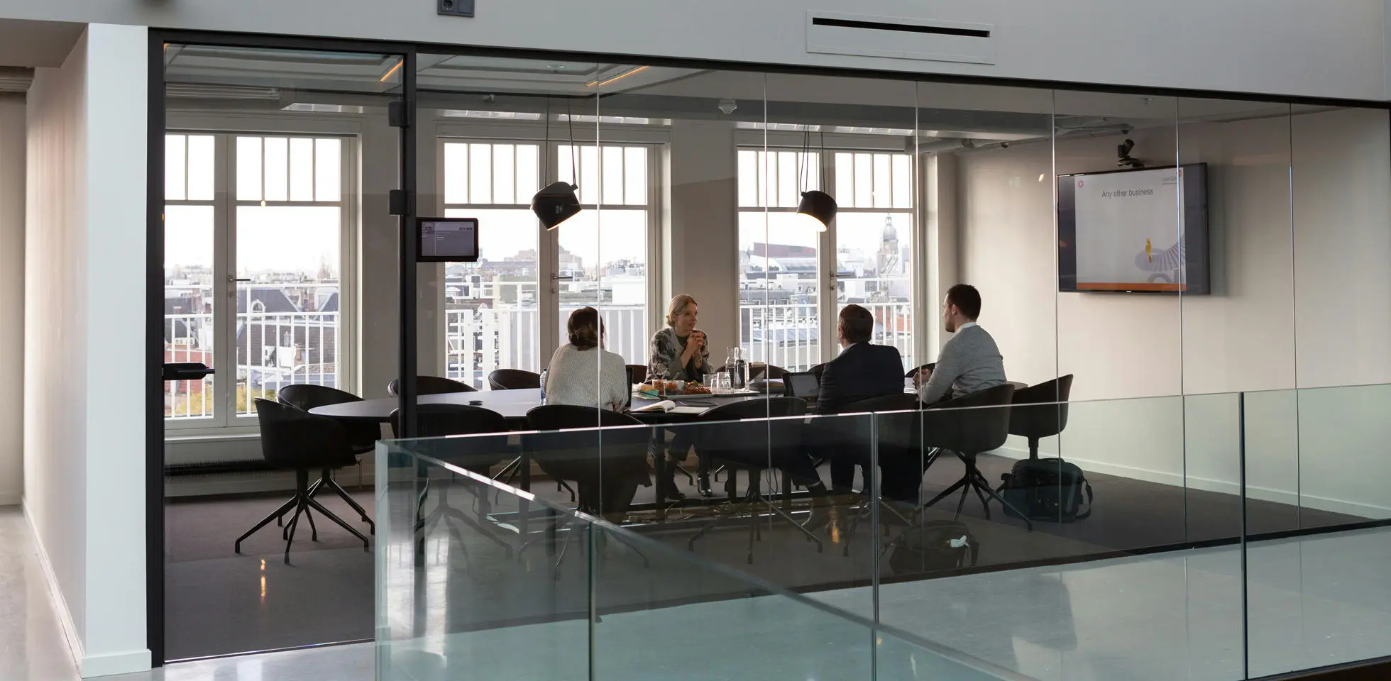 Business meeting. Photo by Rodeo Project Management Software on Unsplash.