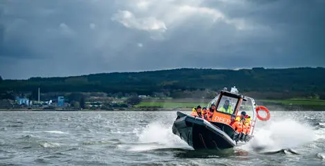 DEEP boat in front of Glenmorangie Distillery. Credit: Charné Hawkes Photography.