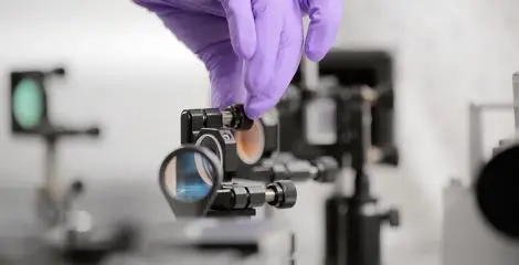 Scientists work with lasers in one of the Renishaw collaboration projects.