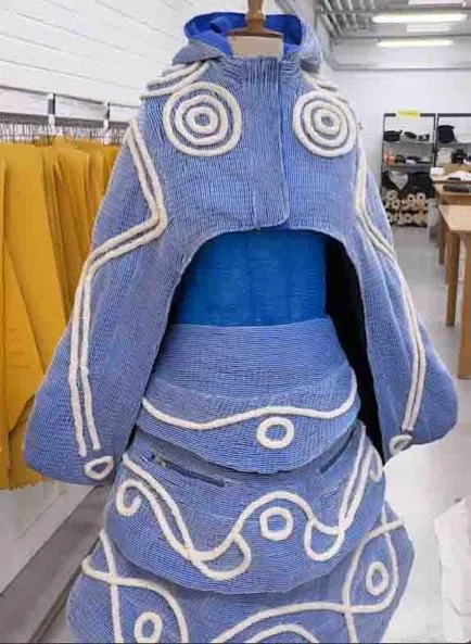 The outfit took around three-weeks to complete. Picture shows the three-piece outfit. It is blue in colour apart from the Pictish details that are white.