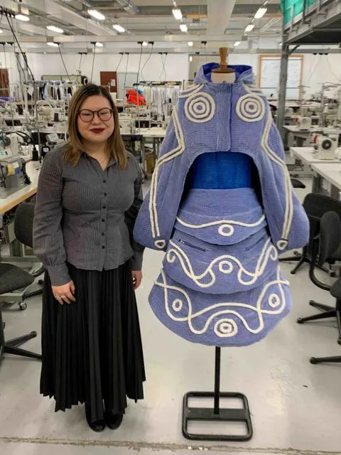 Verna's creation recently featured at an international trade show. Picture shows Verna standing next to her creation.