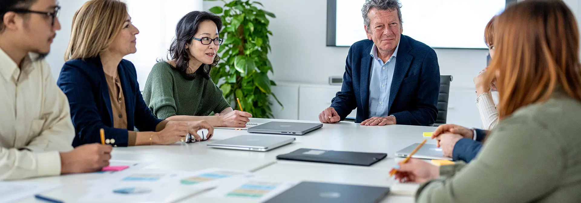 Business meeting in an office for five people