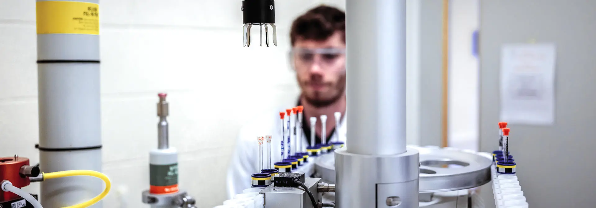 Chemistry student testing chemical samples