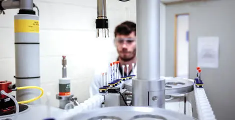 Chemistry student testing chemical samples