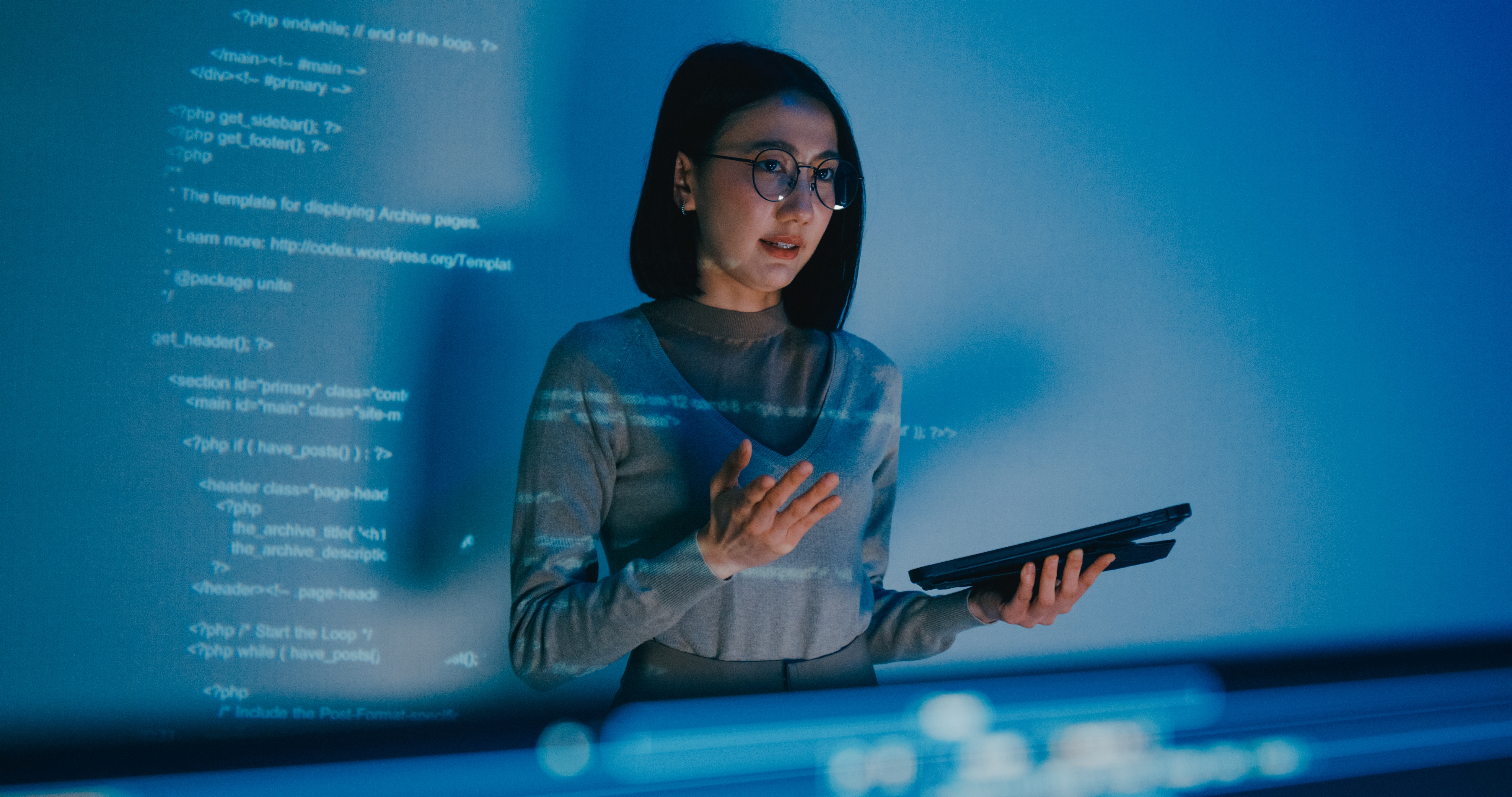 Student presenting their code infront of a projection