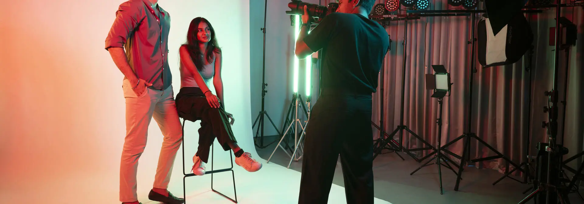 Design Management students model in the photography studio.