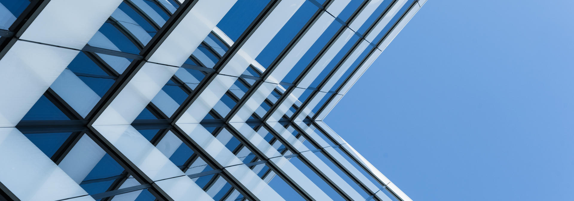 Glass modern building with metal panels