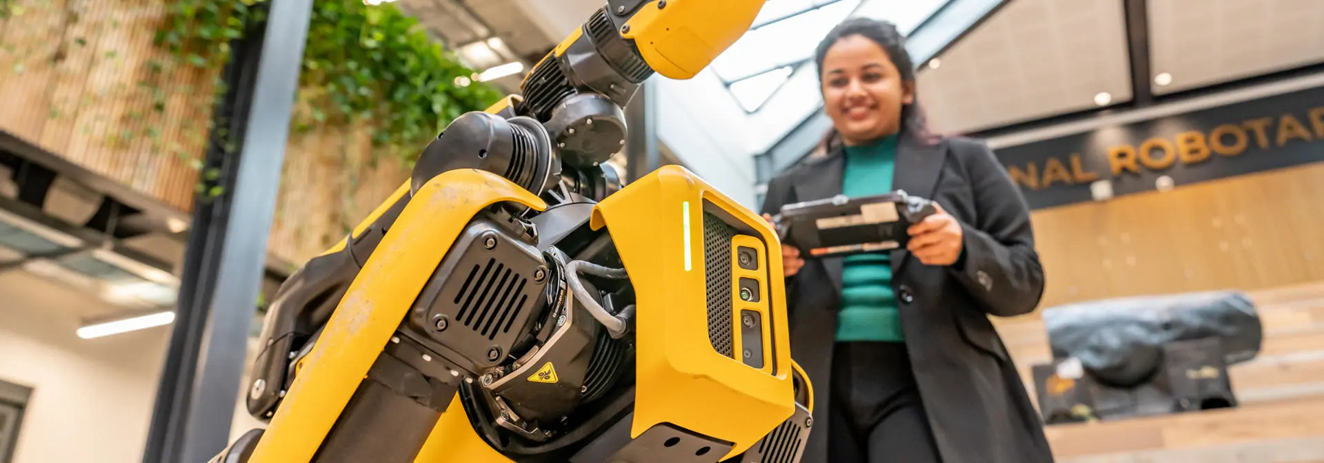 Robot controlled by a student with a remote control