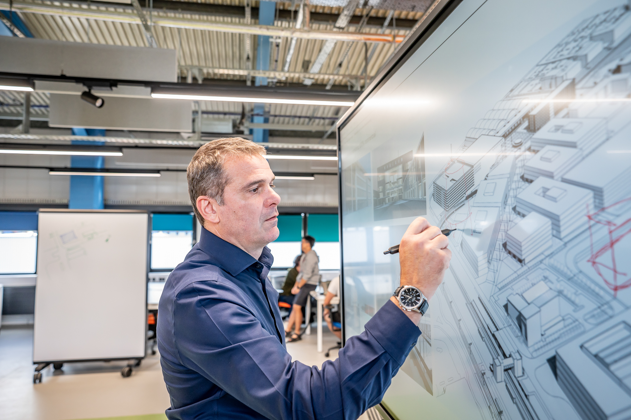 Person drawing over a monitor