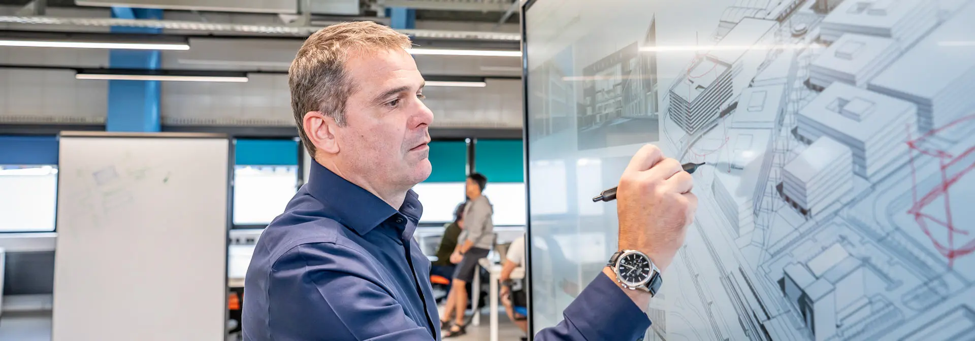 Person drawing over a monitor