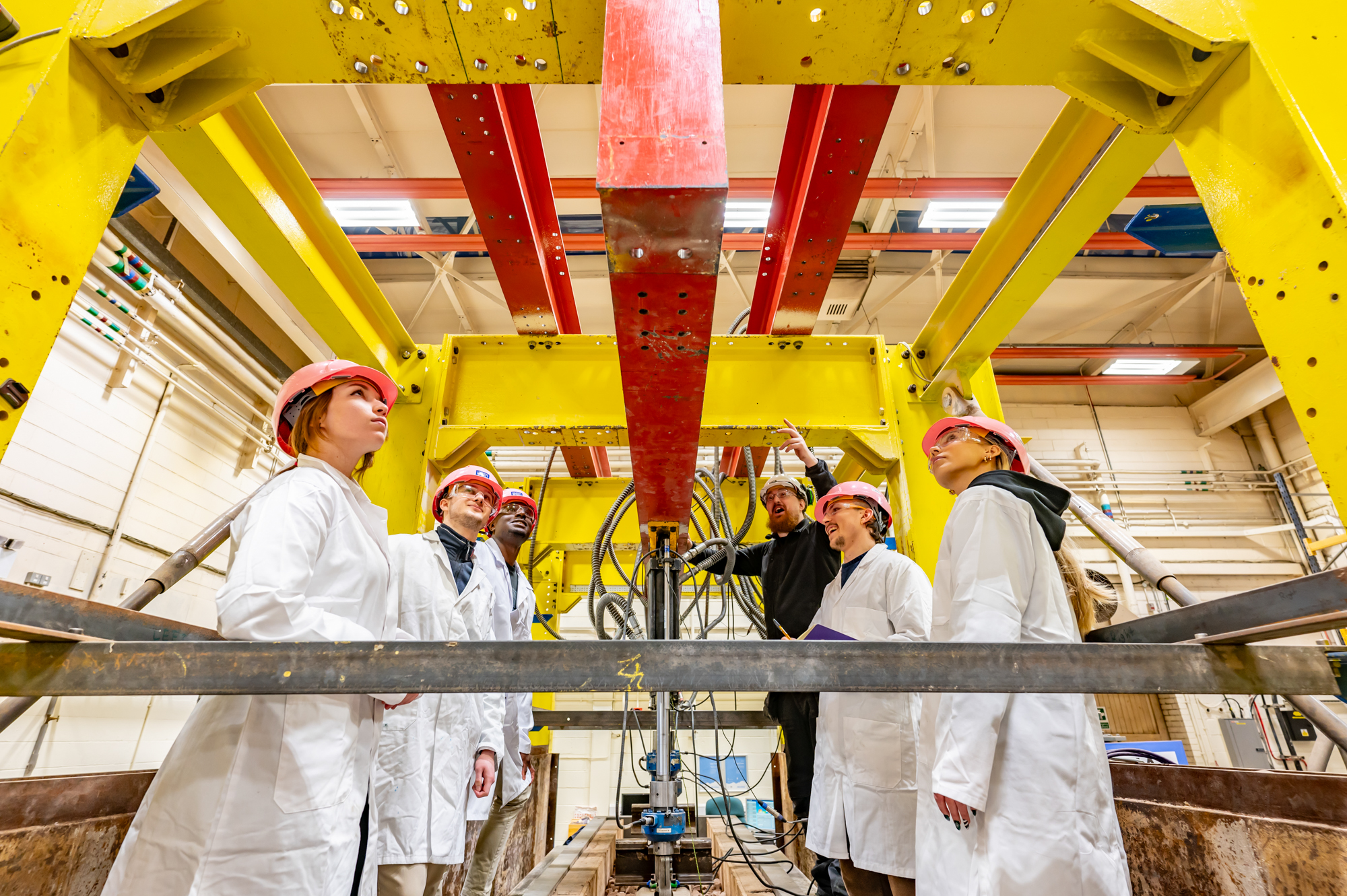 Students doing a pressure test in a lab