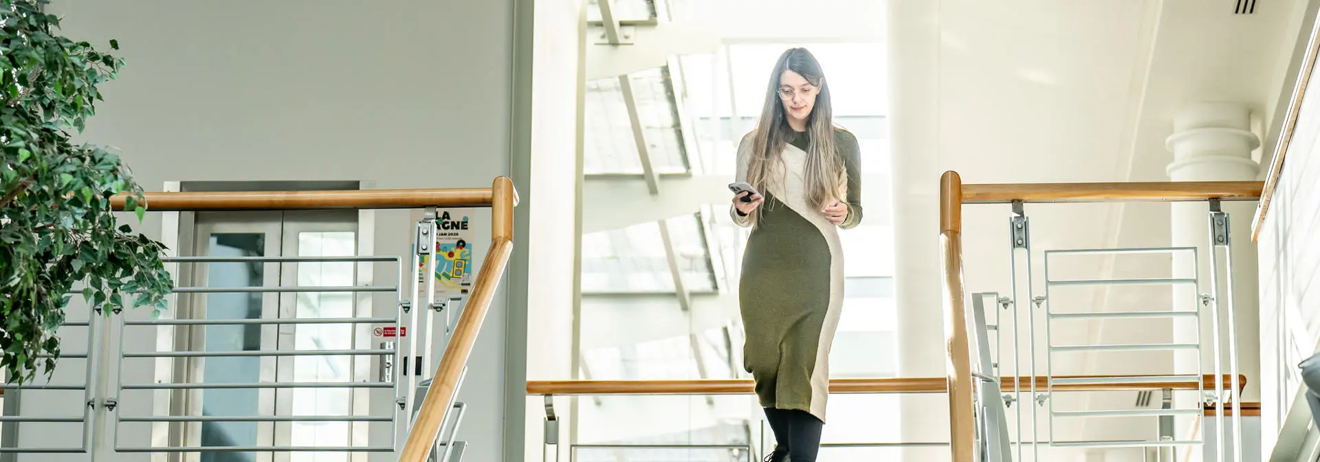 Student walking down the stairs