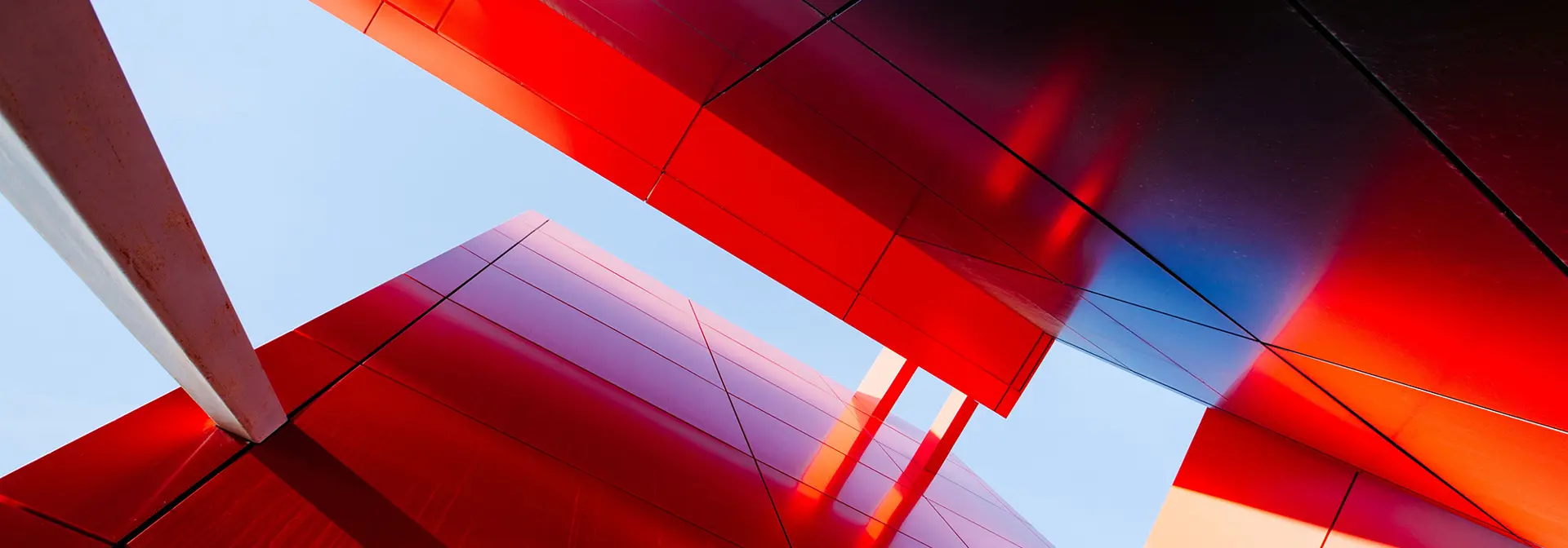 Modern building looks red in the sunlight