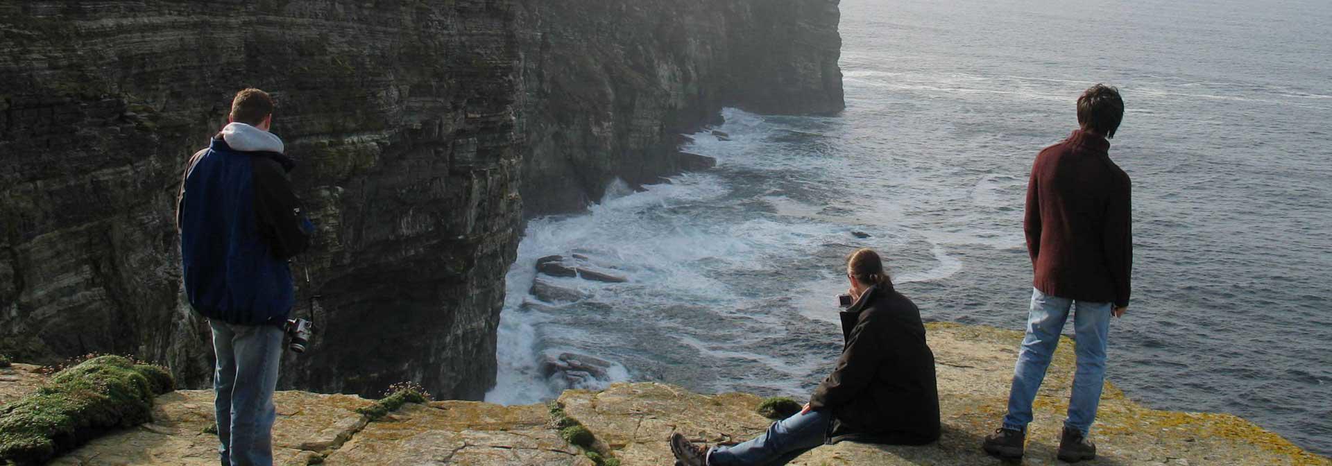 students-cliff-sea