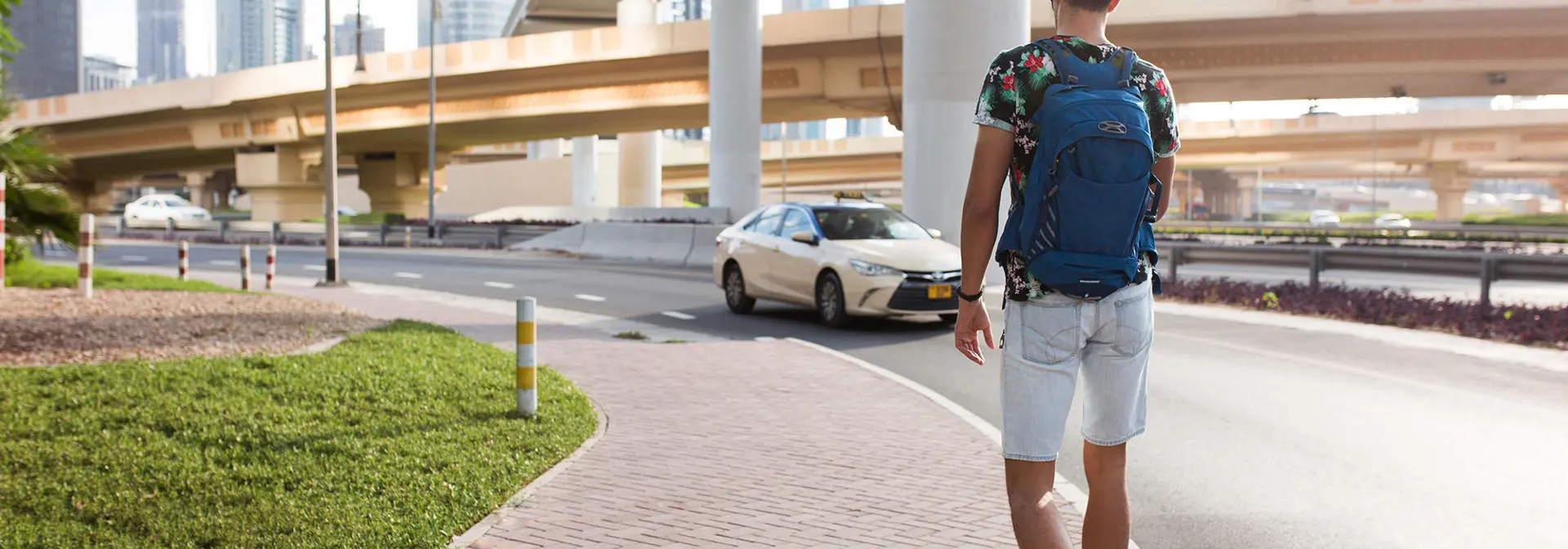 A student walking through Dubai.