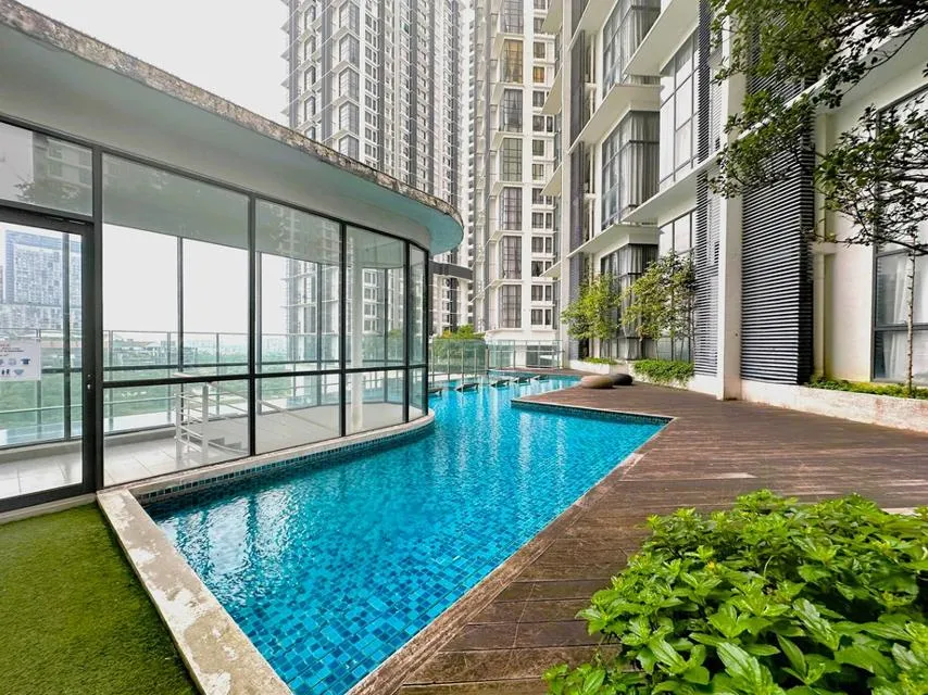 Swimming deck area Swimming pool with buildings in background