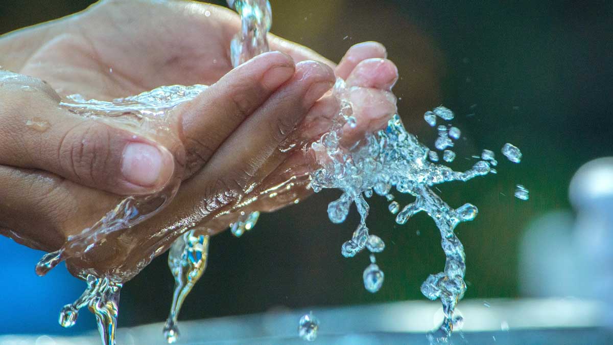 Hand with clean water