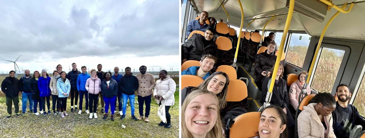 Students posing for photos with a wind turbine in the background and sitting on a bus.