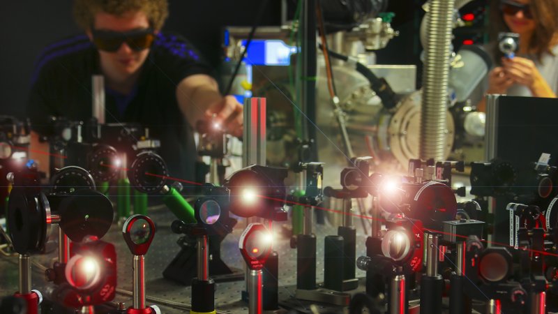 Student working with lasers